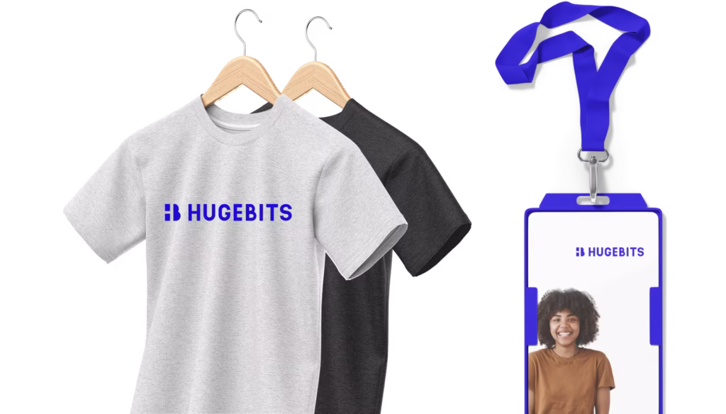 hugebits logo on t-shirts and on a badge